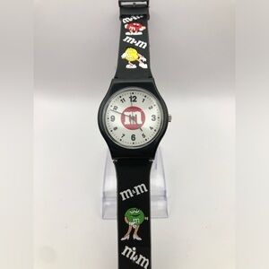 M&M watch all ages black band white face (needs battery) works perfect in box
